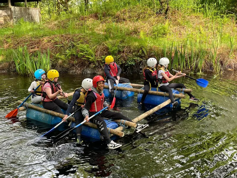 Pupils raft building on a residential trip
